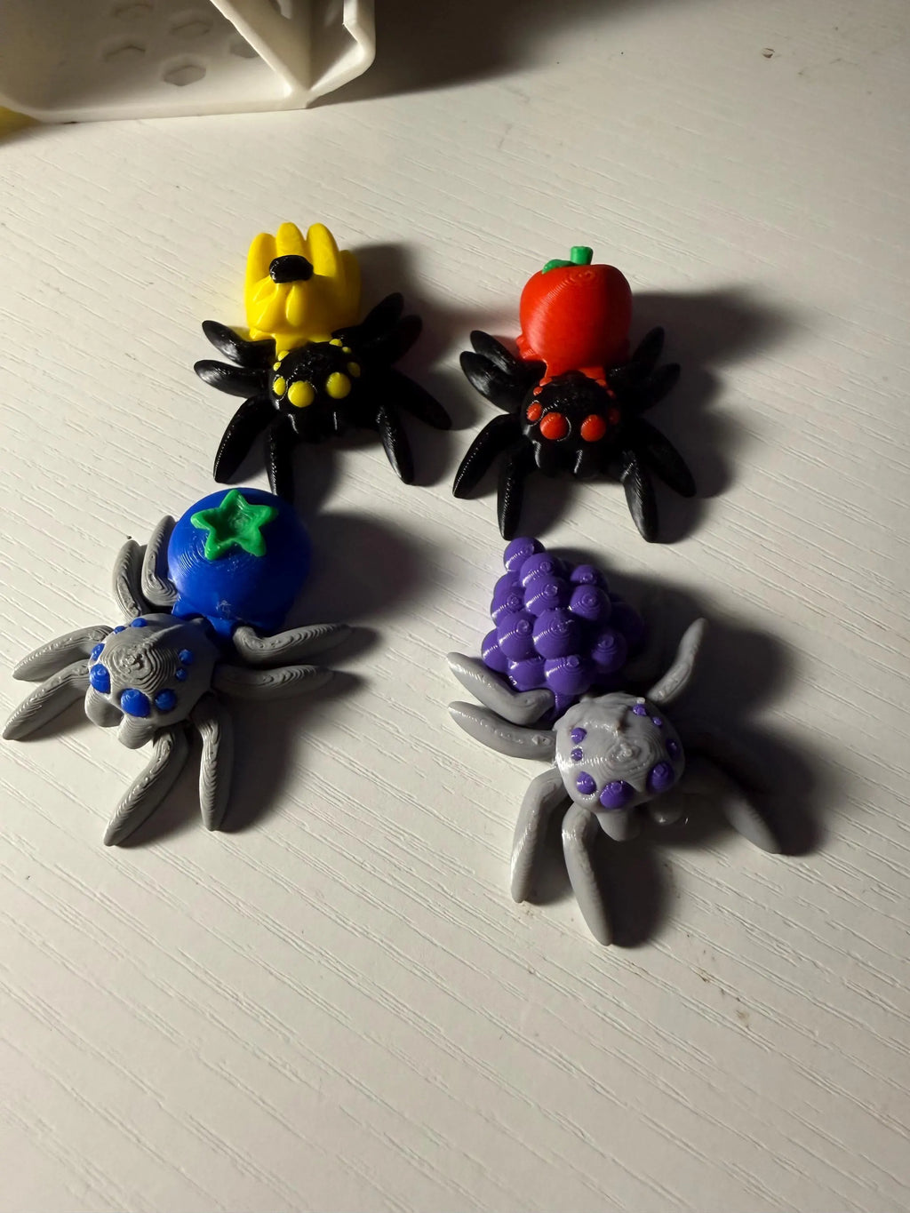Set Of 4 Articulated, Fruit Spiders
