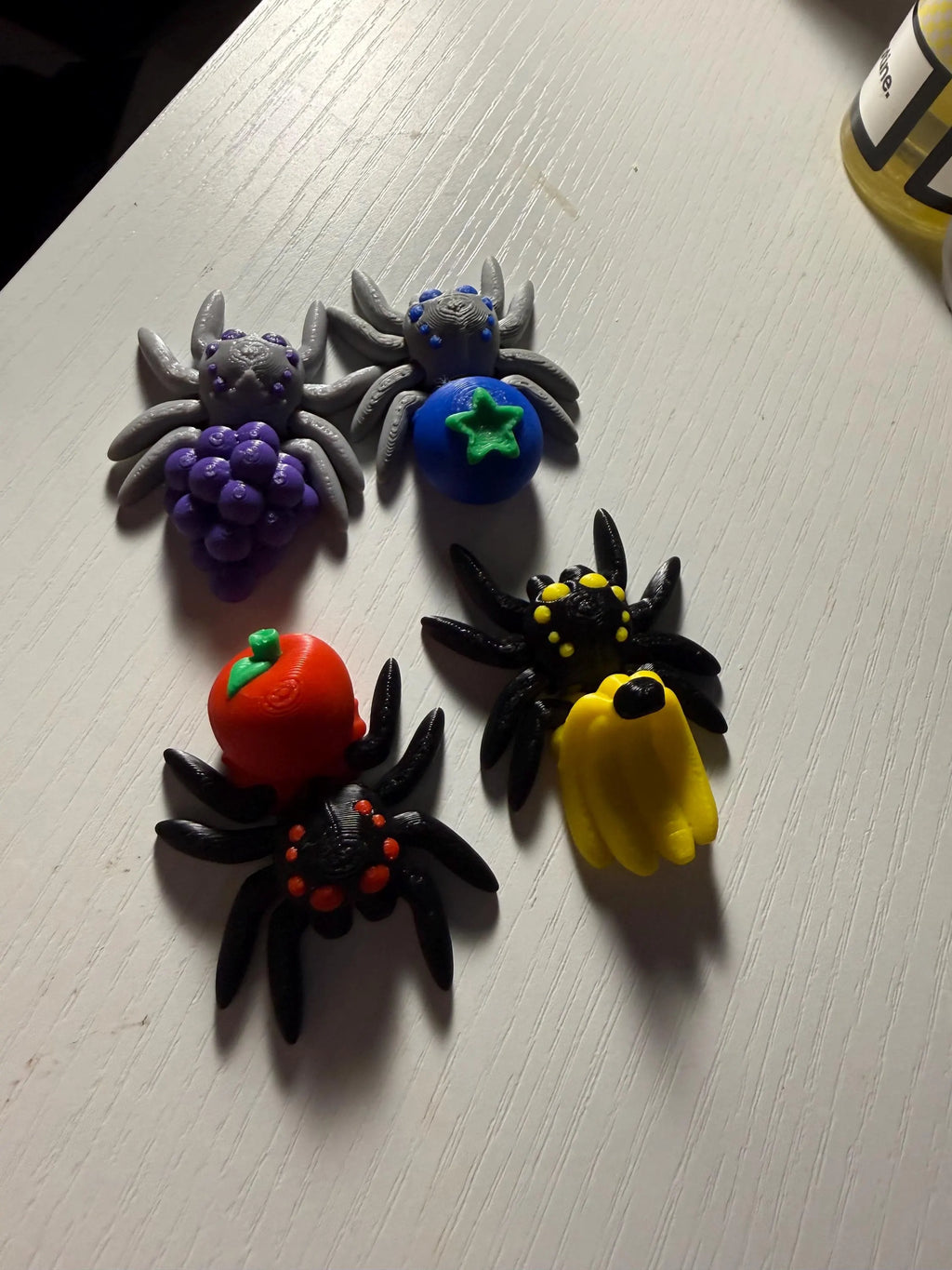 Set Of 4 Articulated, Fruit Spiders