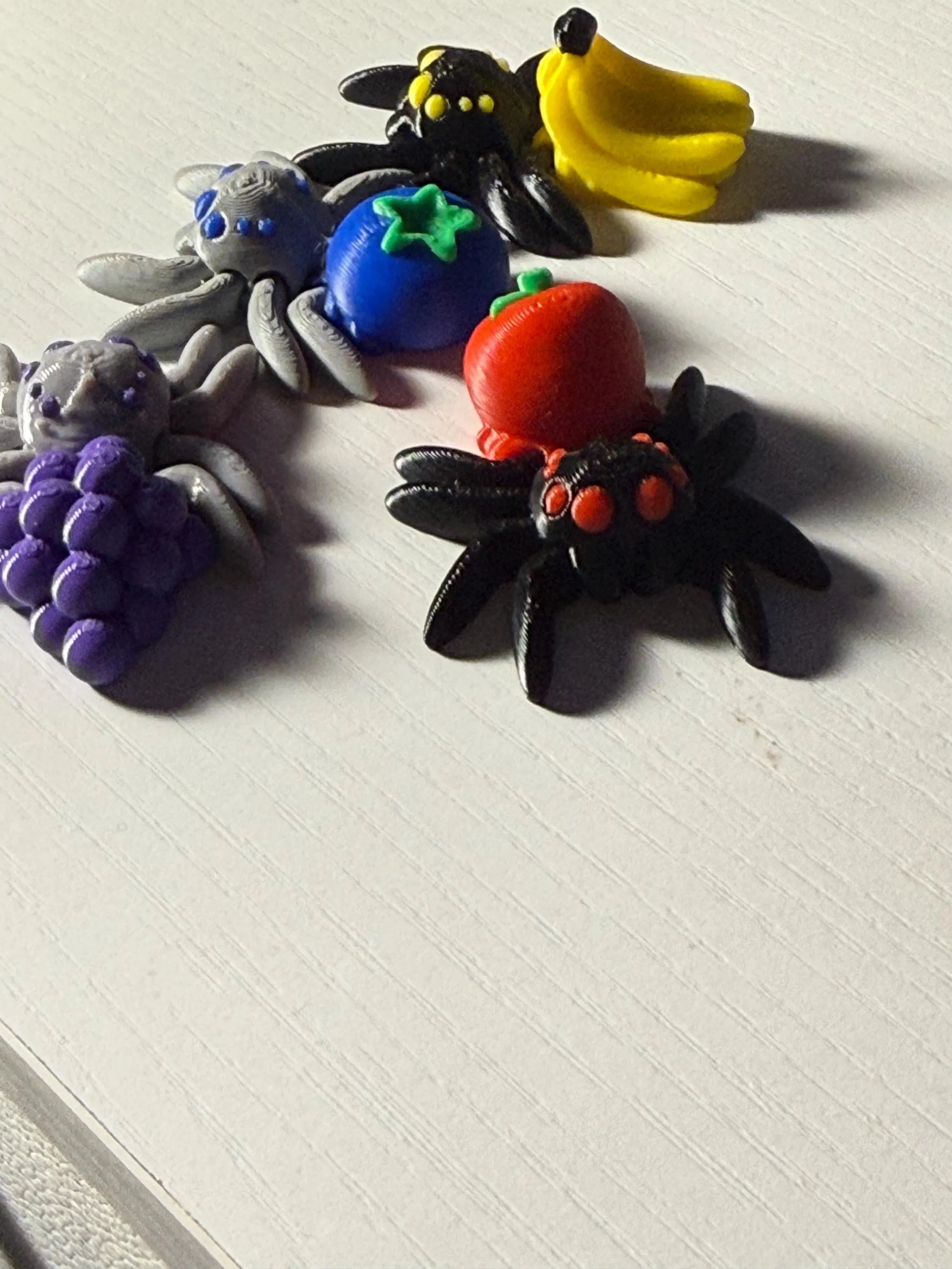 Set Of 4 Articulated, Fruit Spiders